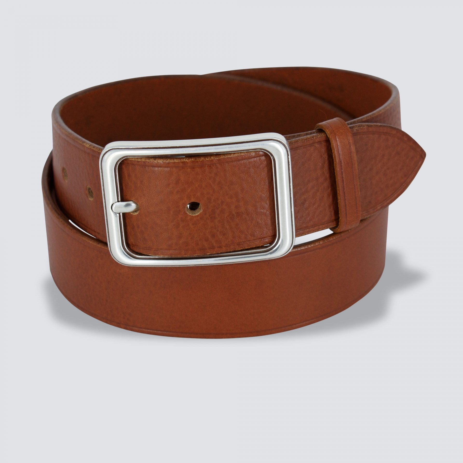 Ceinture cuir prado cognac enroulée fond gris